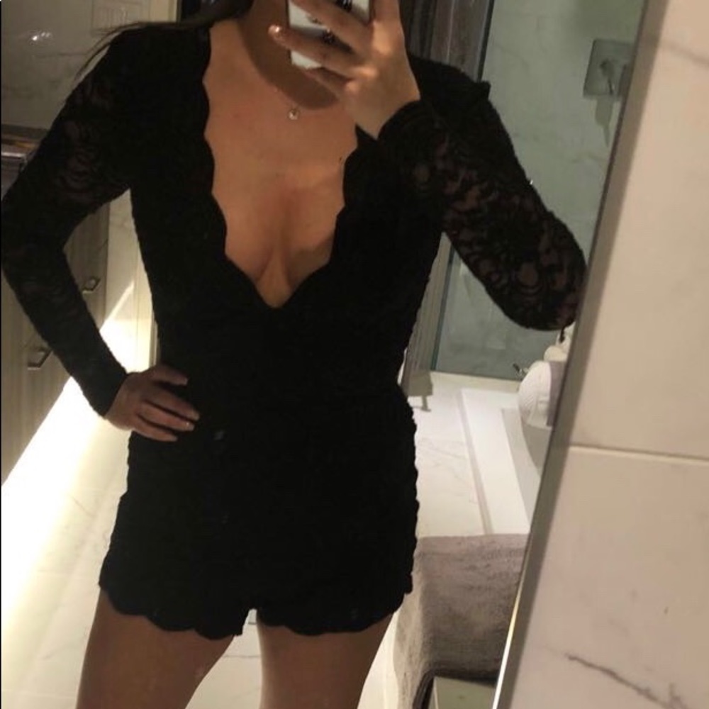 Sexy black laced BEBE romper